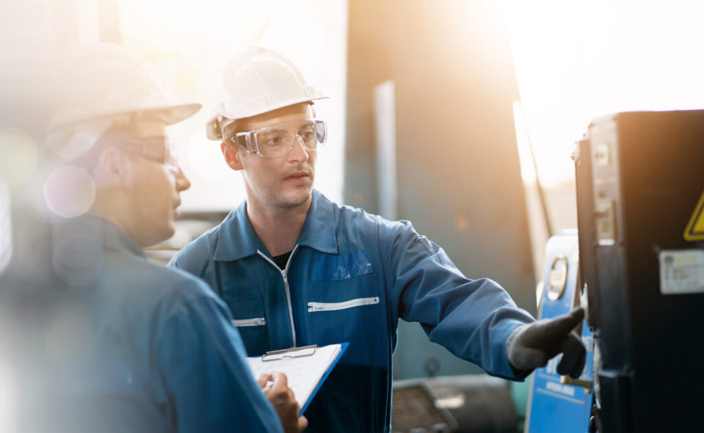 Professional engineer looking at controls