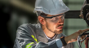 frustrated factory maintenance worker