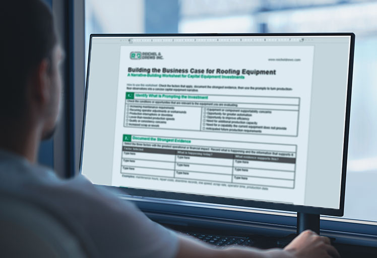 computer with Reichel & Drews worksheet for capital expenditure request